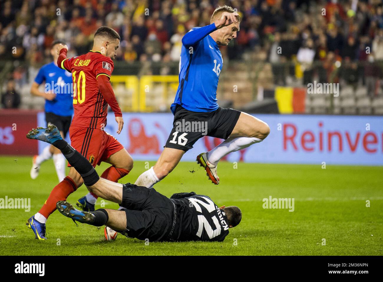 Belgium's Eden Hazard, Estonia's goalkeeper Igonen Matvei and Estonia's Joonas Tamm fight for the ball during a soccer match between Belgian national team the Red Devils and Estonia's national team, in Brussels, Saturday 13 November 2021, game 7 in group E of the qualifications for the 2022 FIFA World Cup. BELGA PHOTO JASPER JACOBS Stock Photo