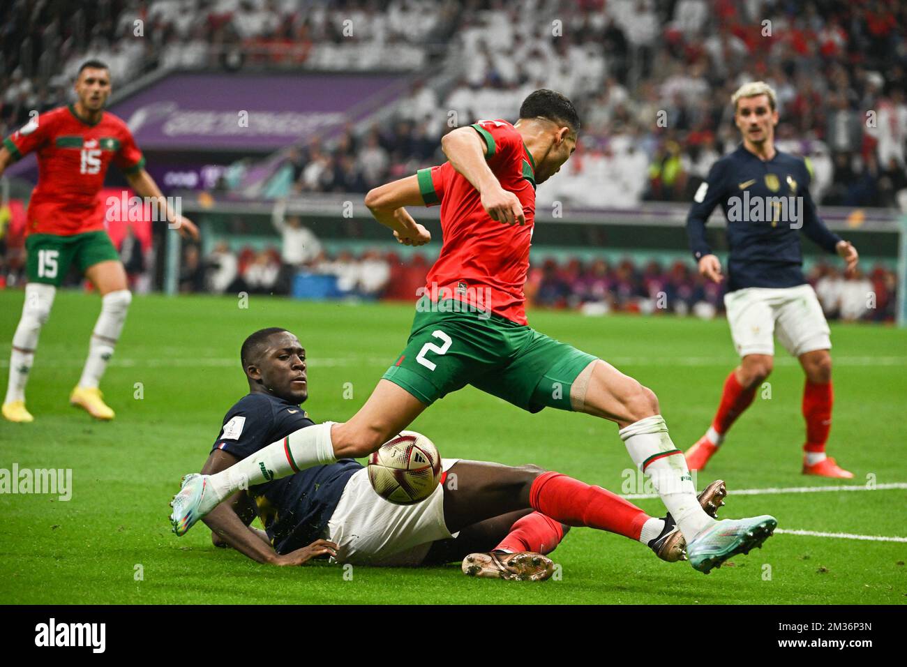 Al Khor, Qatar. 14th Dec, 2022. Ibrahima Konate of France and Achraf