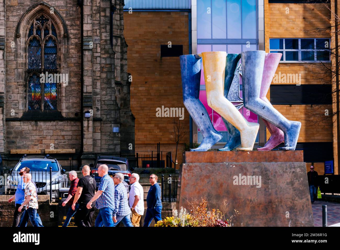 Legs Walking. Statue by local sculptor Armitage consists of 3