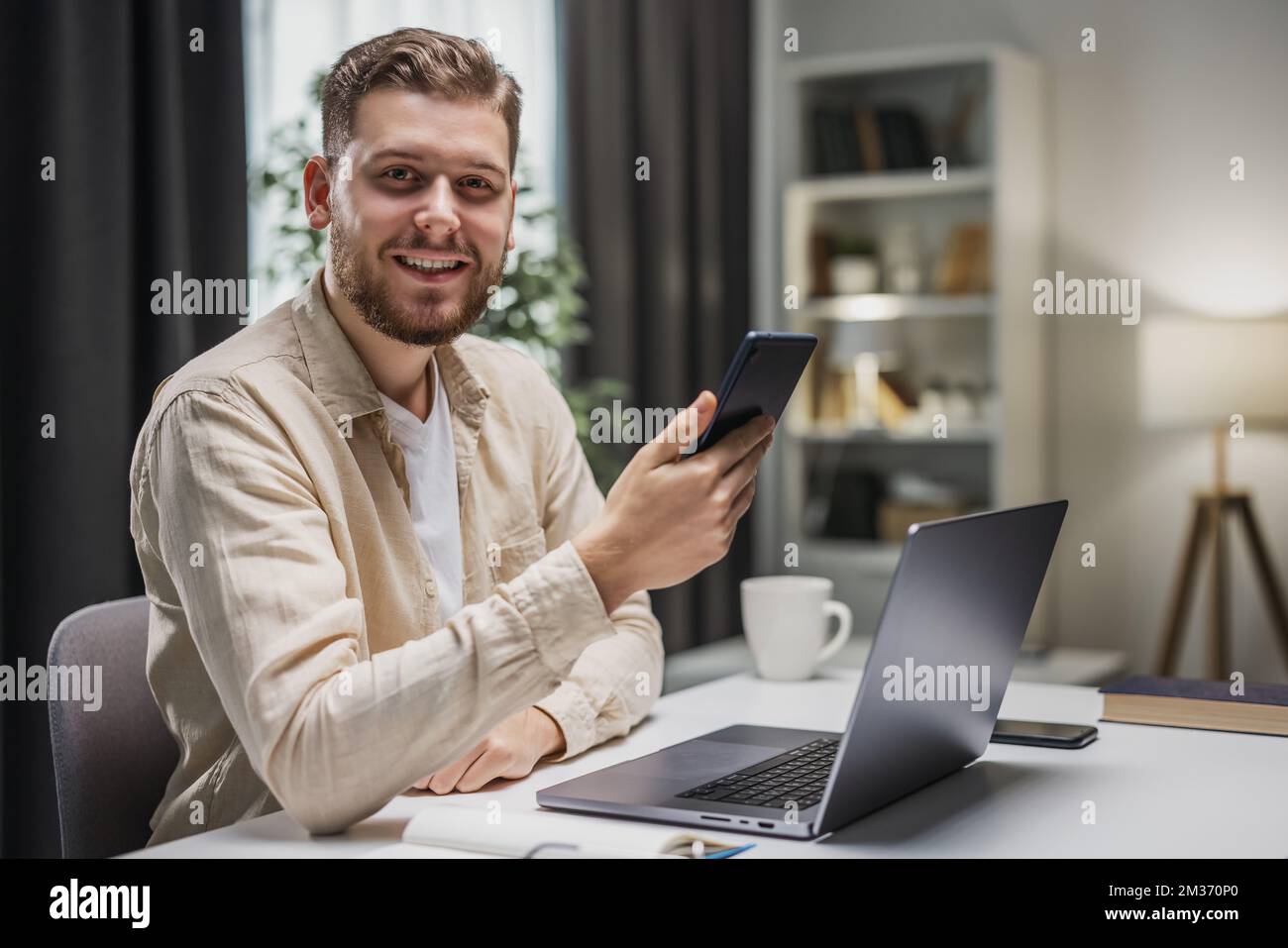 Young businessman smiling Stock Photo