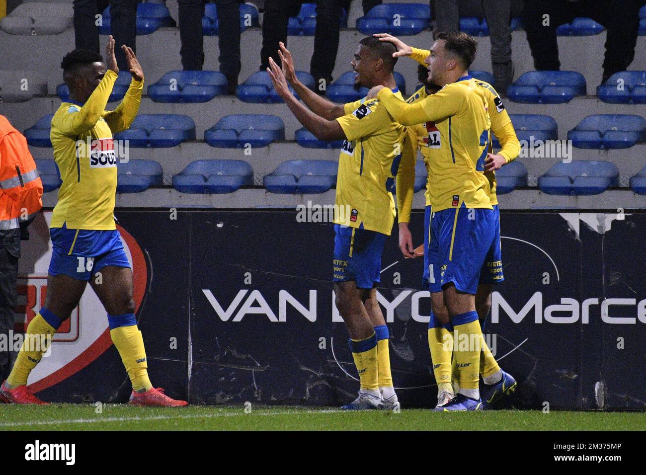 Westerlo's Kouya Mabea, Westerlo's Lyle Foster and Westerlo's Erdon Daci celebrate after scoring during a soccer match between Westerlo and RE Mouscron, Sunday 05 December 2021 in Westerlo, on day 14 of the 'D1B Pro League' second division of the Belgian soccer championship. BELGA PHOTO DAVID PINTENS Stock Photo