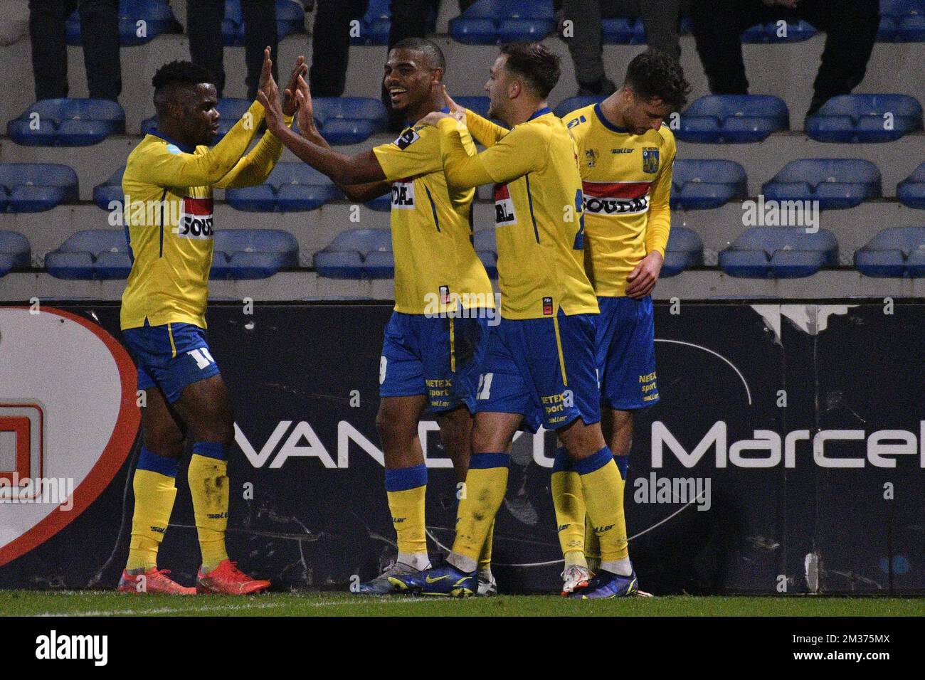 Westerlo's Kouya Mabea, Westerlo's Lyle Foster, Westerlo's Erdon Daci and Westerlo's Kyan Vaesen celebrate after scoring during a soccer match between Westerlo and RE Mouscron, Sunday 05 December 2021 in Westerlo, on day 14 of the 'D1B Pro League' second division of the Belgian soccer championship. BELGA PHOTO DAVID PINTENS Stock Photo