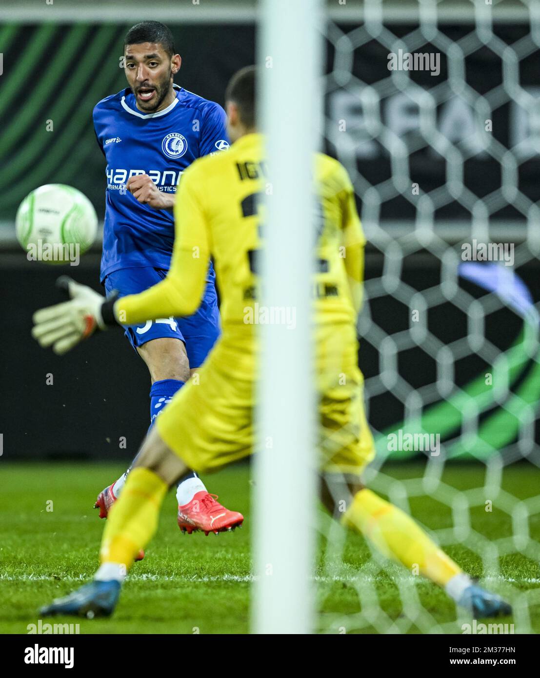 Gent's Tarik Tissoudali and Flora's goalkeeper Matvei Igonen fight for the ball during a UEFA Conference League game between Belgian soccer team KAA Gent and Estonian soccer team FC Flora Tallinn, Thursday 09 December 2021 in Gent on the sixth and last day of the UEFA Conference League group stage, in group B. BELGA PHOTO JASPER JACOBS Stock Photo