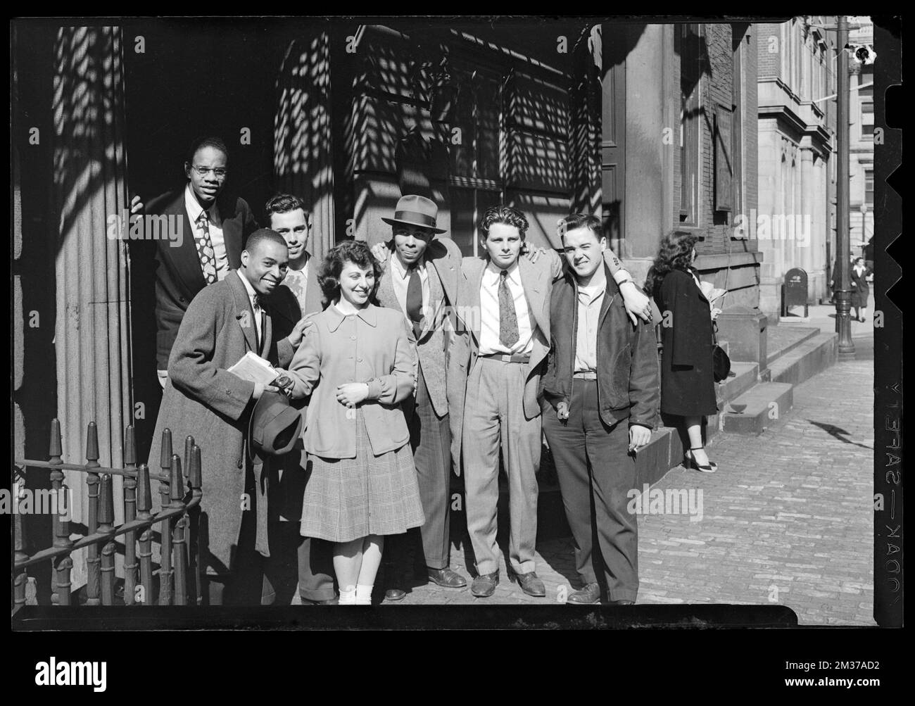 Group portrait of one women and six men including Jack Miller , Miller
