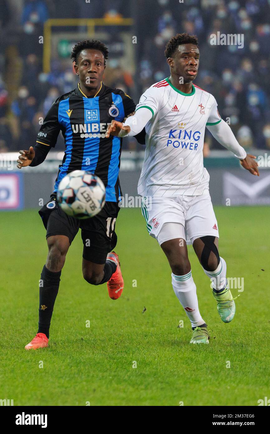 Club's Kamal Sowah and OHL's Jesse Sekidika fight for the ball during a soccer game between Club Brugge and OH Leuven, Thursday 23 December 2021 in Brugge, in the quarter final of the 'Croky Cup' Belgian soccer cup. BELGA PHOTO KURT DESPLENTER Stock Photo