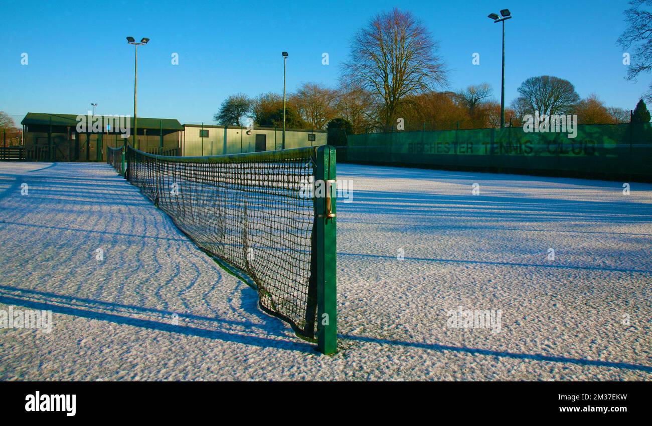 A tennis court covered in snow and ice, Ribchester, Preston, Lancashire, United Kingdom, Europe Stock Photo