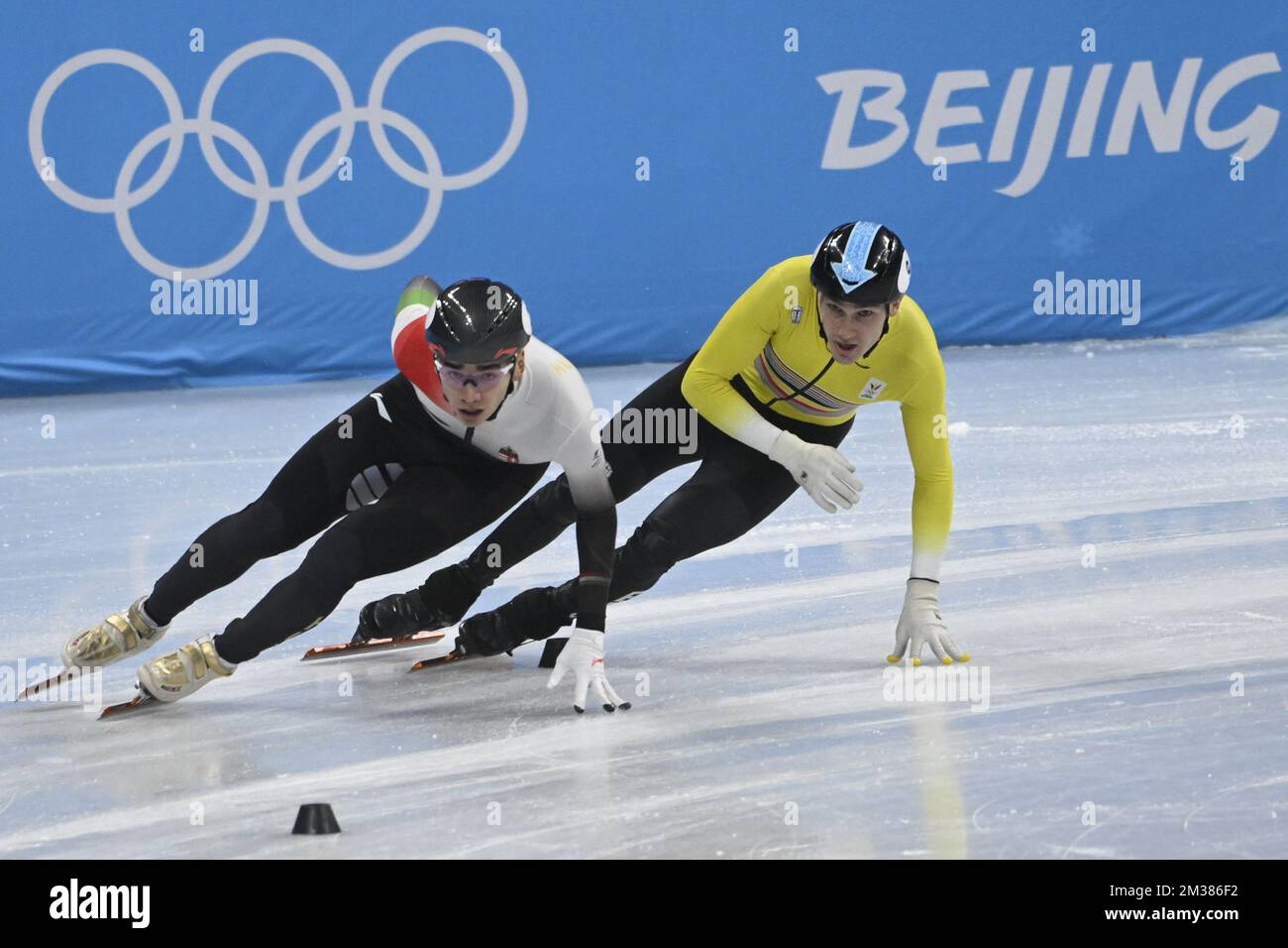 Hungarian Shaolin Sandor Liu and Belgian shorttrack skater Stijn Desmet pictured in action during the men's Shorttrack 1000m qualifier at the Beijing 2022 Winter Olympics in Beijing, China, Saturday 05 February 2022. The winter Olympics are taking place from 4 February to 20 February 2022. BELGA PHOTO LAURIE DIEFFEMBACQ  Stock Photo