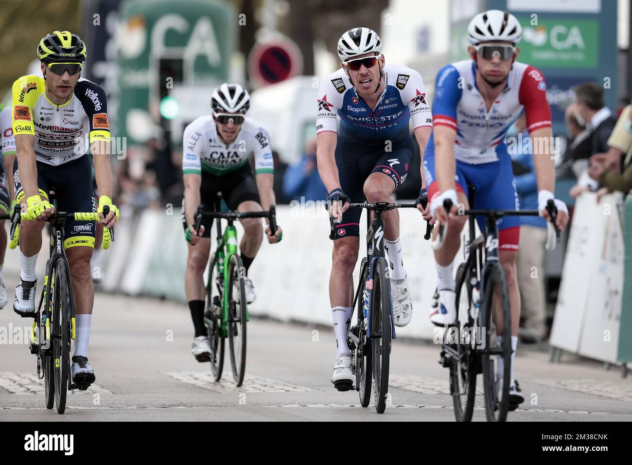 Belgian Tim Declercq (2R) of Quick-Step Alpha Vinyl crosses the finish ...