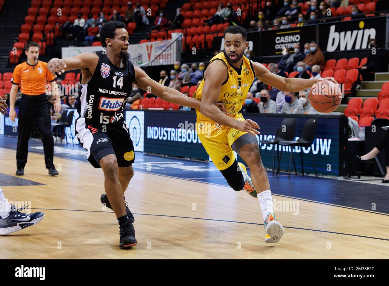 Limburg's Clifford Hamonds and Oostende's Phil Booth fight for the ball  during a basketball match between BC Oostende and Limburg United, Friday 18  February 2022 in Oostende, on day 17 of the