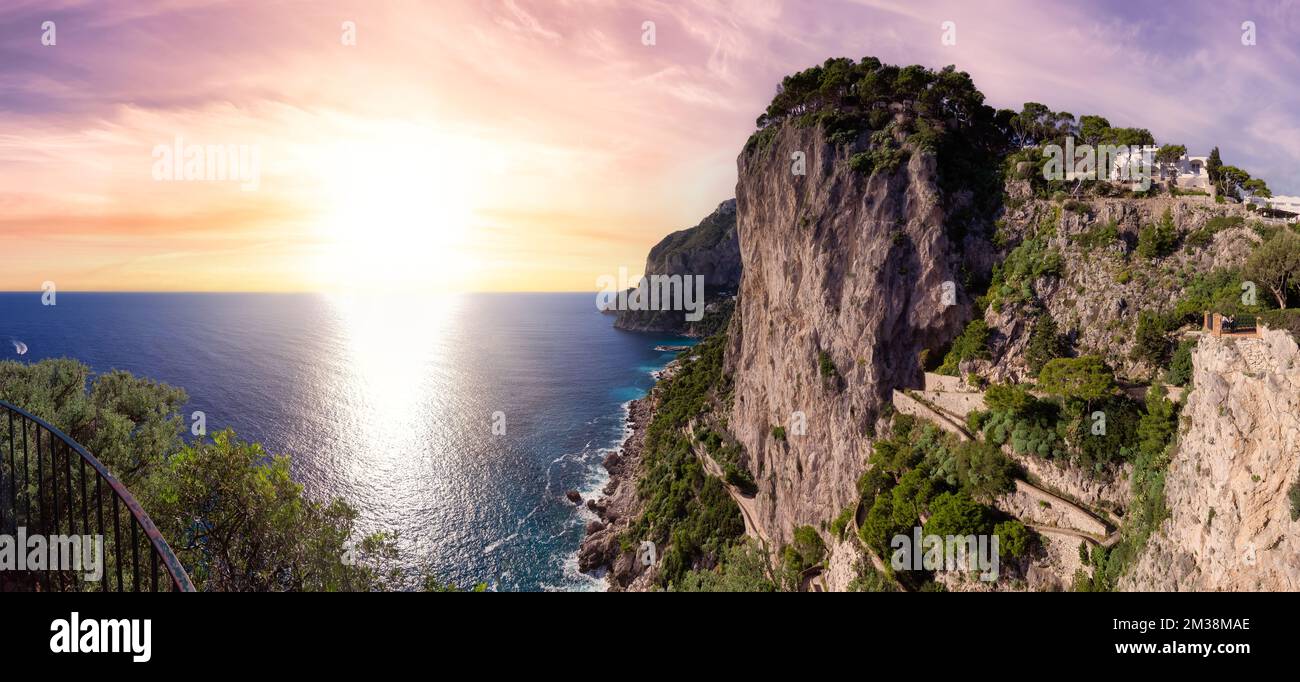 Rocky Coast by Sea at Touristic Town on Capri Island in Bay of Naples, Italy Stock Photo