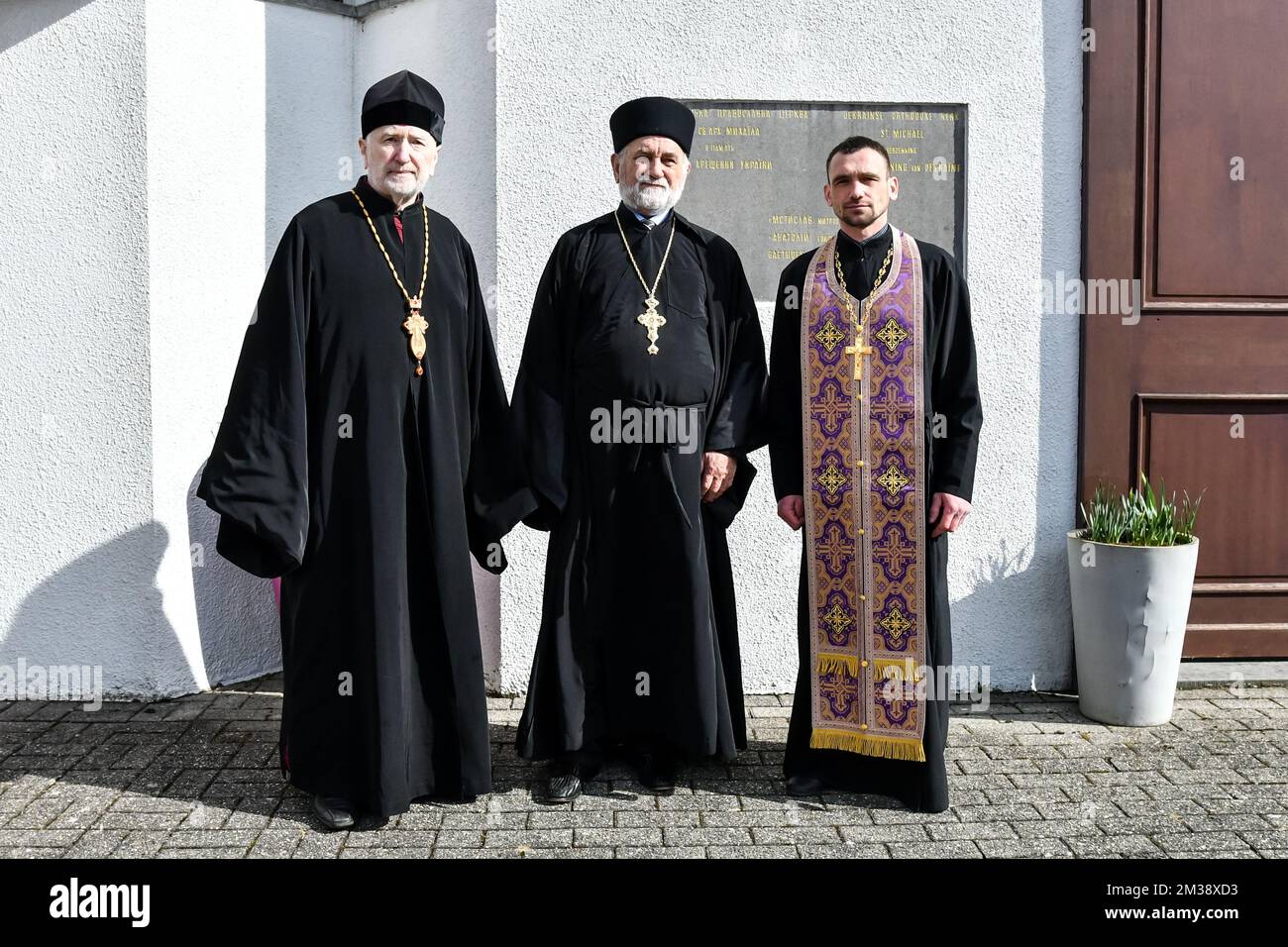 Archbishop Athenagoras Peckstadt of the Orthodox church in Belgium, and two  unidentified priests pictured during a visit of Flemish minister Somers to  the Ukrainian community in Genk, Friday 04 March 2022. Following