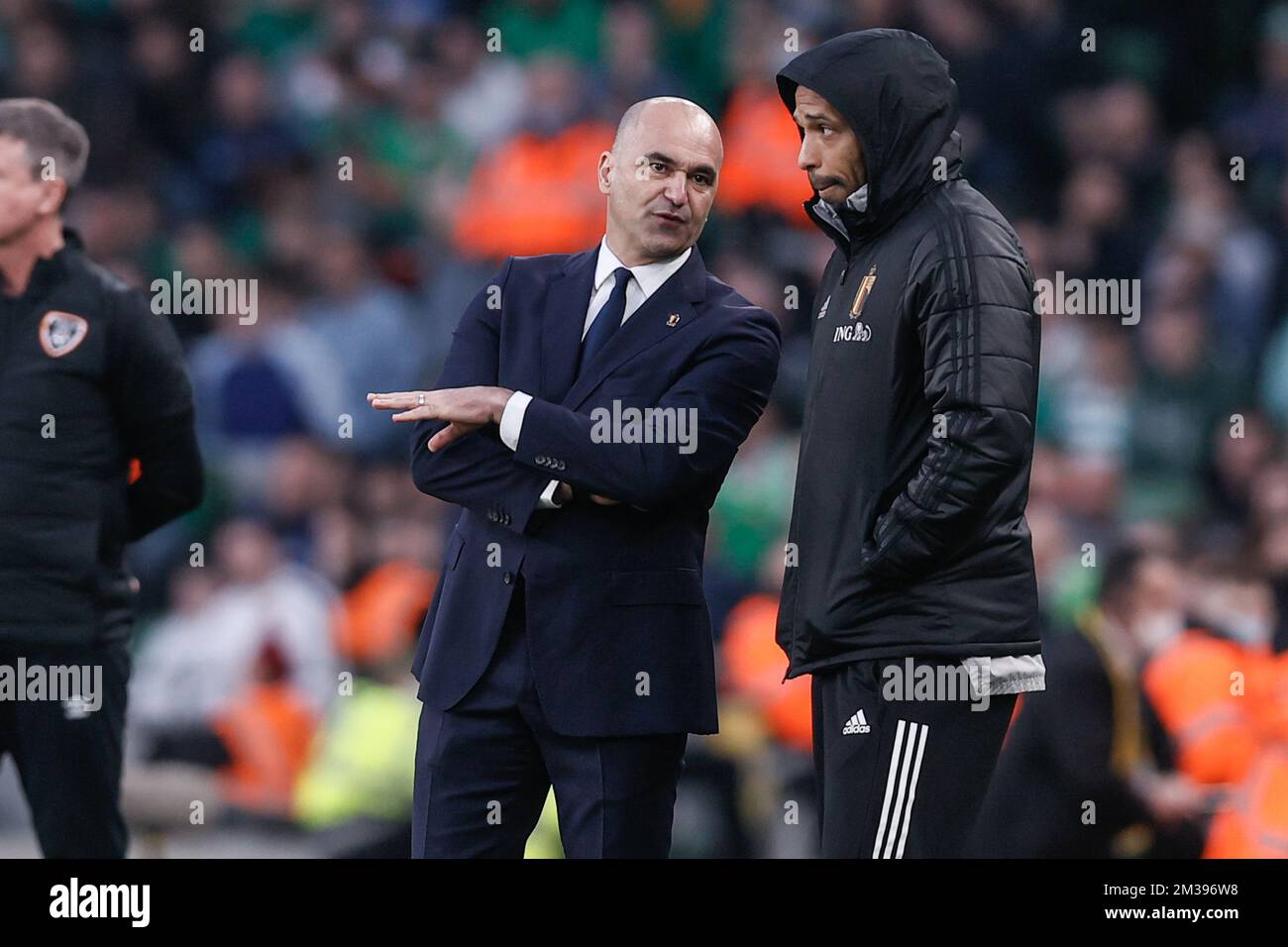 Belgium's head coach Roberto Martinez and Belgium's assistant coach Thierry Henry pictured during a friendly soccer match between Ireland and the Belgian national team, the Red Devils, Saturday 26 March 2022 in Dublin. BELGA PHOTO BRUNO FAHY Stock Photo