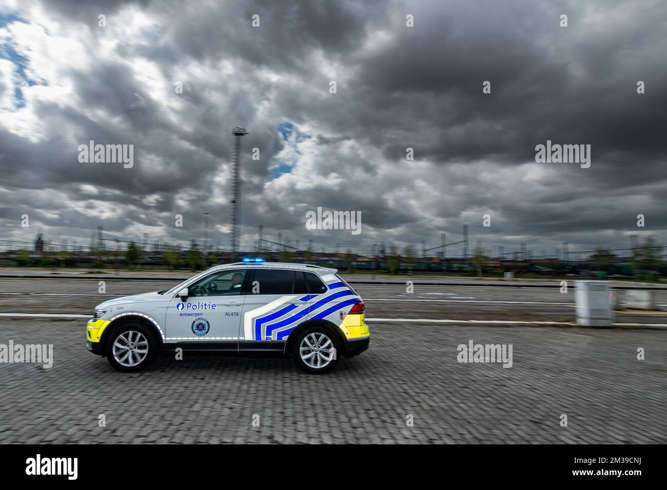 Illustration image shows a police vehicle during a photo opportunity