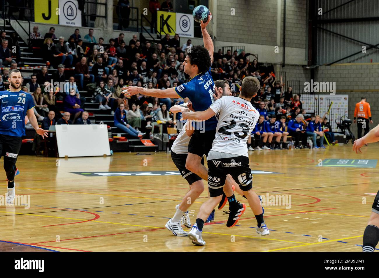 Thomas Bolaers (4) of Handbal Tongeren, Jeroen De Beule (44) of Achilles Bocholt and Louis