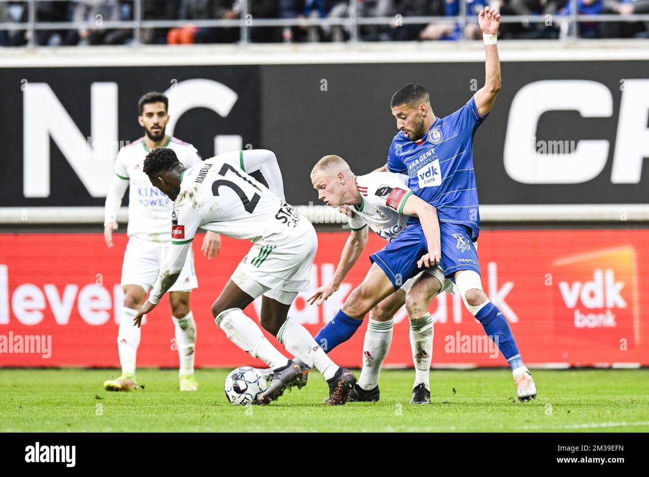 OHL's Louis Patris and Gent's Tarik Tissoudali fight for the ball