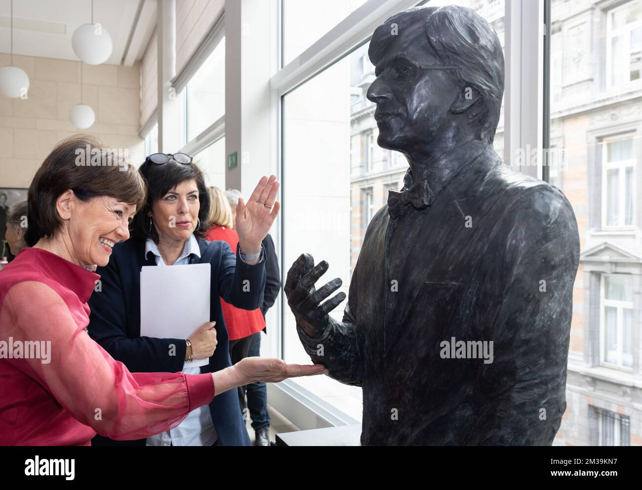 PS' Laurette Onkelinx and Joelle Milquet pictured during the inauguration of a sculpture of Walloon Minister President and former Prime Minister Elio Di Rupo, Friday 22 April 2022 at the Chamber at the Federal Parliament in Brussels. BELGA PHOTO BENOIT DOPPAGNE Stock Photo