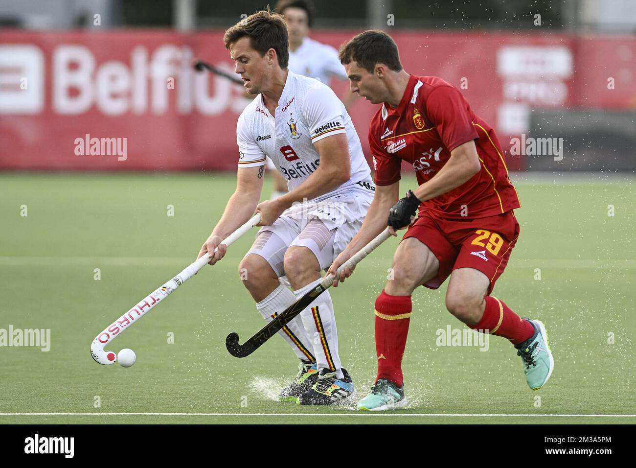 Belgium's Tom Boon and Spain's Gerard Clapes fight for the ball during a hockey match between the Belgian Red Lions and Spain in the group stage (game 8 out of 16) of the Men's FIH Pro League competition, Saturday 21 May 2022 in Wilrijk, Antwerp. BELGA PHOTO LAURIE DIEFFEMBACQ Stock Photo