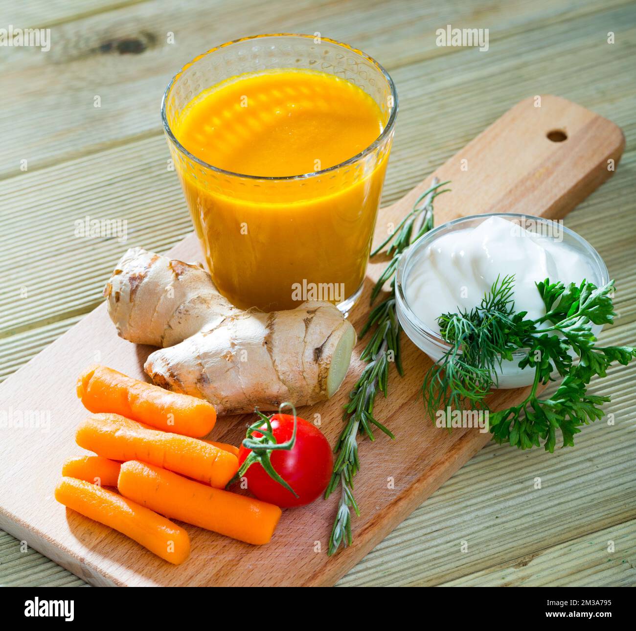 Freshly squeezed carrotginger juice Stock Photo Alamy