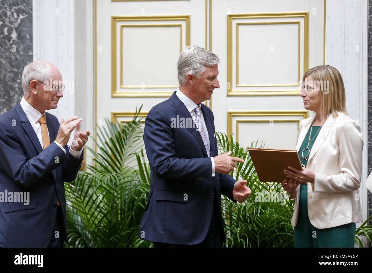 Herman Van Rompuy, King Philippe - Filip of Belgium and Veerle Rots pictured during a ceremony to award the 'Francqui Prize' scientifi awards for 2021 and 2022, Wednesday 01 June 2022 in Brussels. The 2021 prize is awarded to ULiege astrologist Michael Gillon, ULiege's Veerle Rots will receive the 2022 one for her Palaeolithic Stone Tool Hafting research. The scientific prize, which is often referred to as the 'Belgian Nobel Prize', is awarded by The Francqui Foundation and is worth 250.000 euros. BELGA PHOTO NICOLAS MAETERLINCK Stock Photo