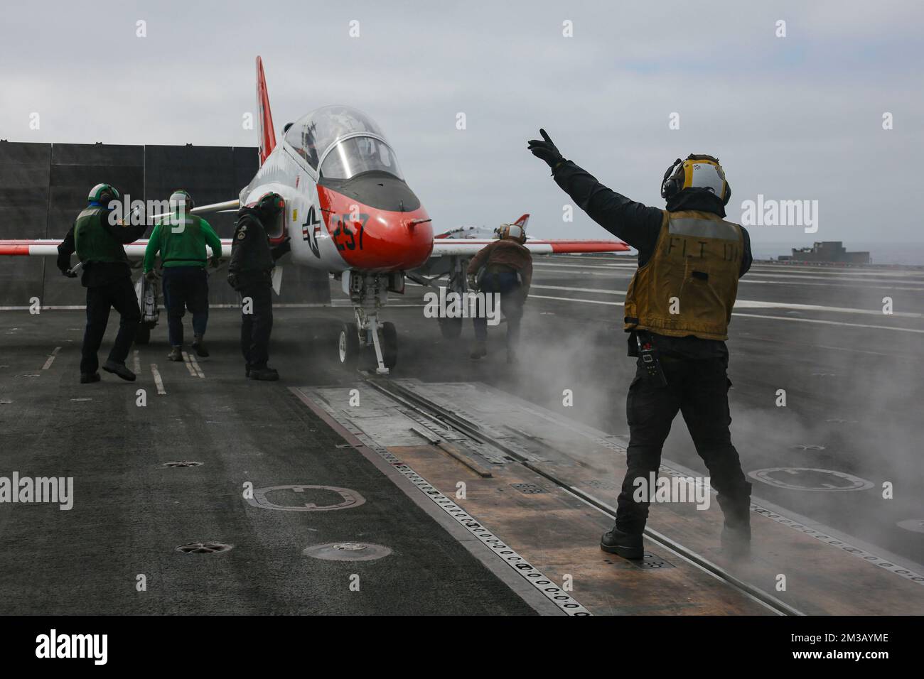 DVIDS - Images - U.S. Sailor directs a T-45C Goshawk jet attached to Chief  of Naval Air Training Command for launch off the flight deck of the  aircraft carrier USS John C.