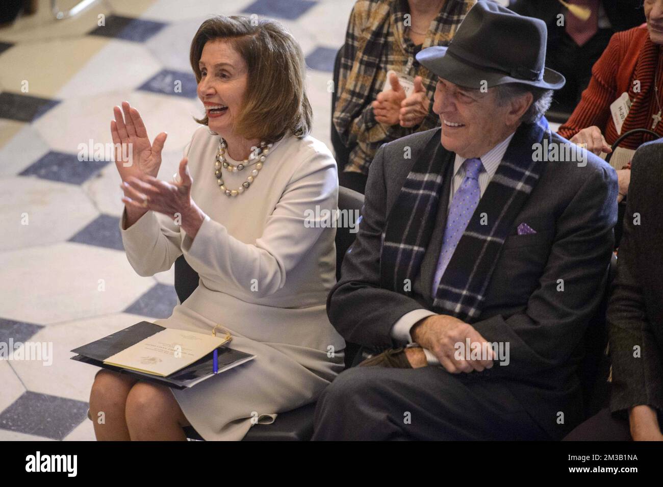 Washington, United States. 14th Dec, 2022. Speaker of the House Nancy Pelosi, D-CA, and her husband, Paul Pelosi, laugh during her portrait unveiling ceremony in Statuary Hall at the U.S. Capitol in Washington, DC on Wednesday, December 14, 2022. Pelosi is the first female speaker of the house. Photo by Bonnie Cash/UPI Credit: UPI/Alamy Live News Stock Photo