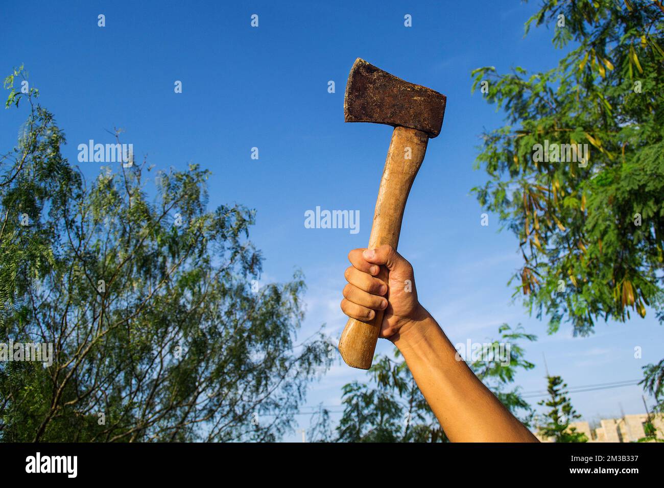 A Rugged Hand Holding an Axe Ina Firm Grip. Stock Image - Image of closeup,  fire: 106779465