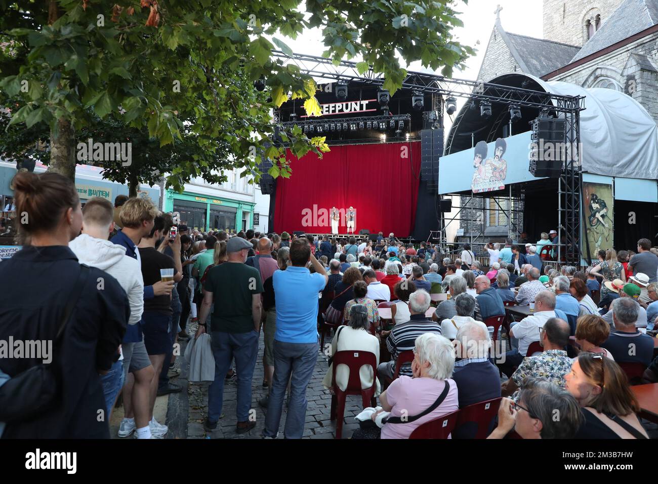 People watch a concert on the opening day of the 179th edition of the 'Gentse Feesten' city festival in Gent, Friday 15 July 2022. This year's edition takes place from 15 to 24 July. BELGA PHOTO NICOLAS MAETERLINCK  Stock Photo