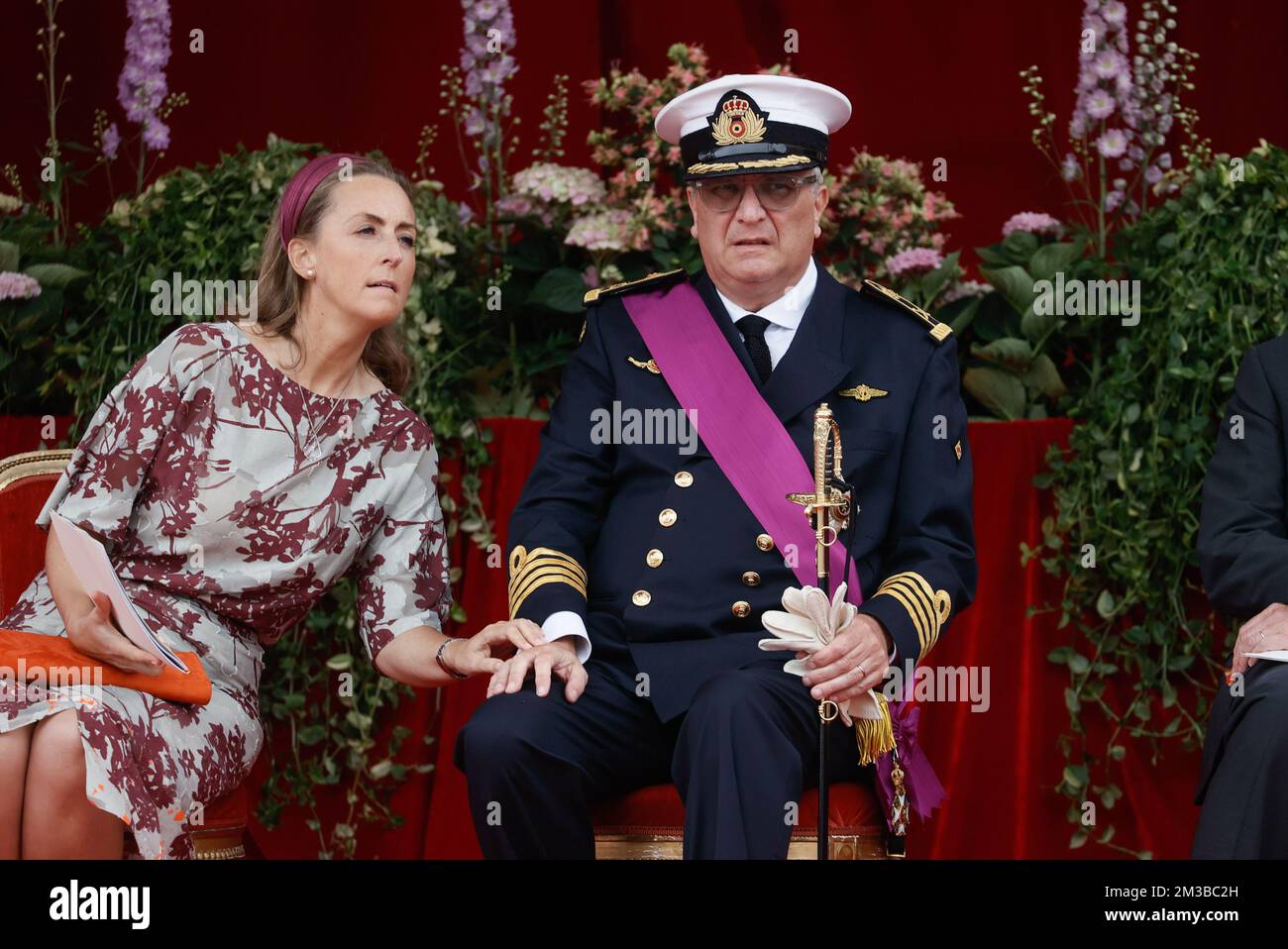 Belgian Prince Laurent (L) is pictured with Princess Claire (R) and her  daughter Princess Louise on the podium during the military parade on the  occasion of Belgium?s National Day in Brussels, Belgium