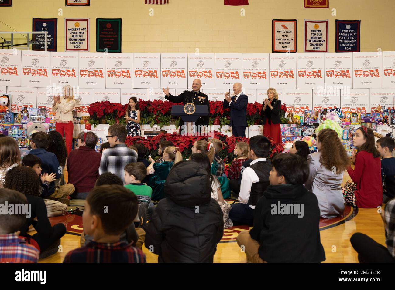 Arlington, United States. 12 December, 2022. U.S. Marine Corps Reserve General David Bellon, center,  welcomes President Joe Biden and First Lady Jill Biden, right, to the 75th anniversary Toys for Tots sorting at Joint Base Myer-Henderson Hall, December 12, 2022 in Arlington, Virginia.  Credit: Sgt. Ellen Schaaf/US Marine Corps/Alamy Live News Stock Photo