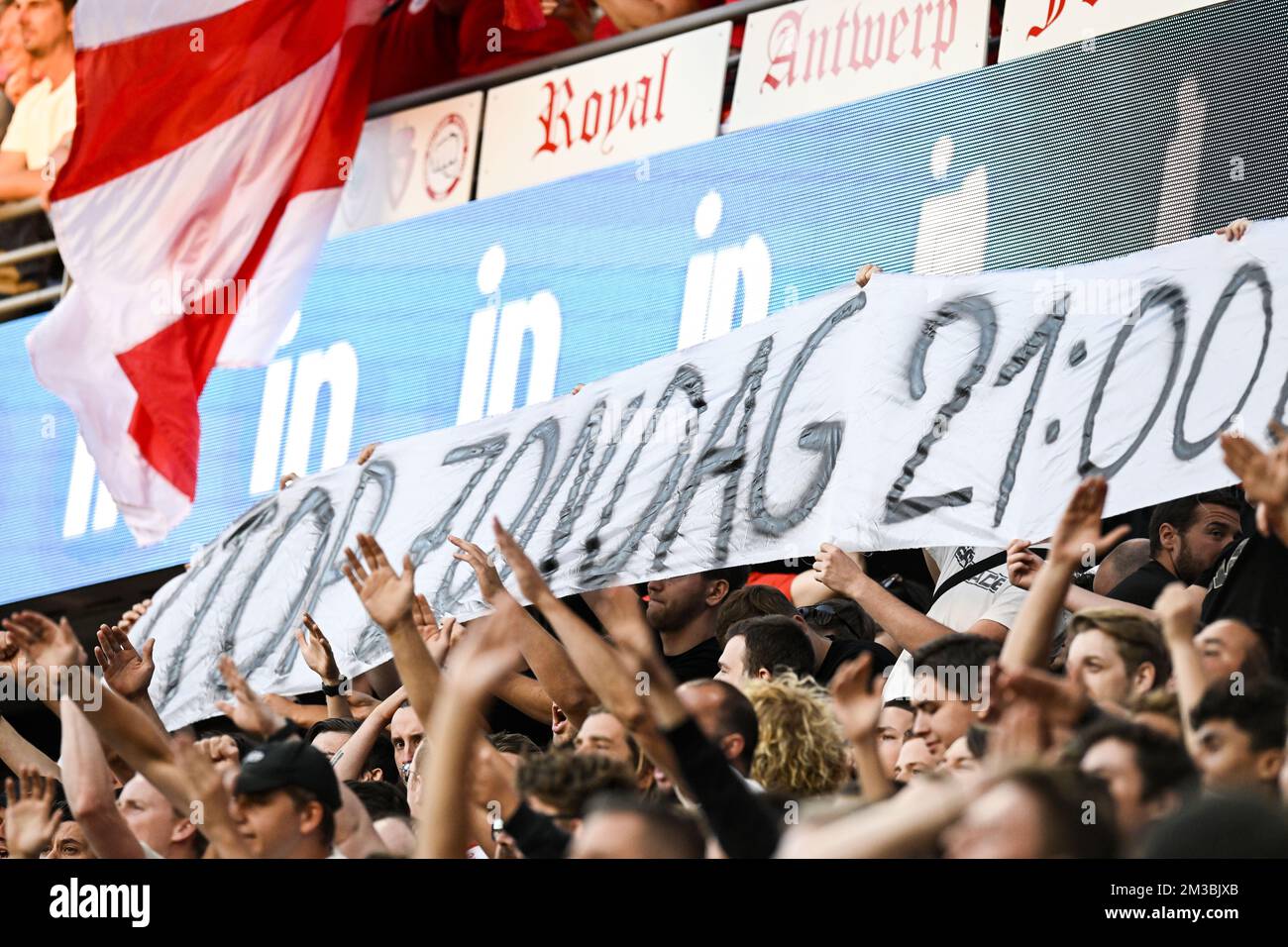 Antwerp's supporters with a banner against late evening Sunday matches ahead of a soccer match