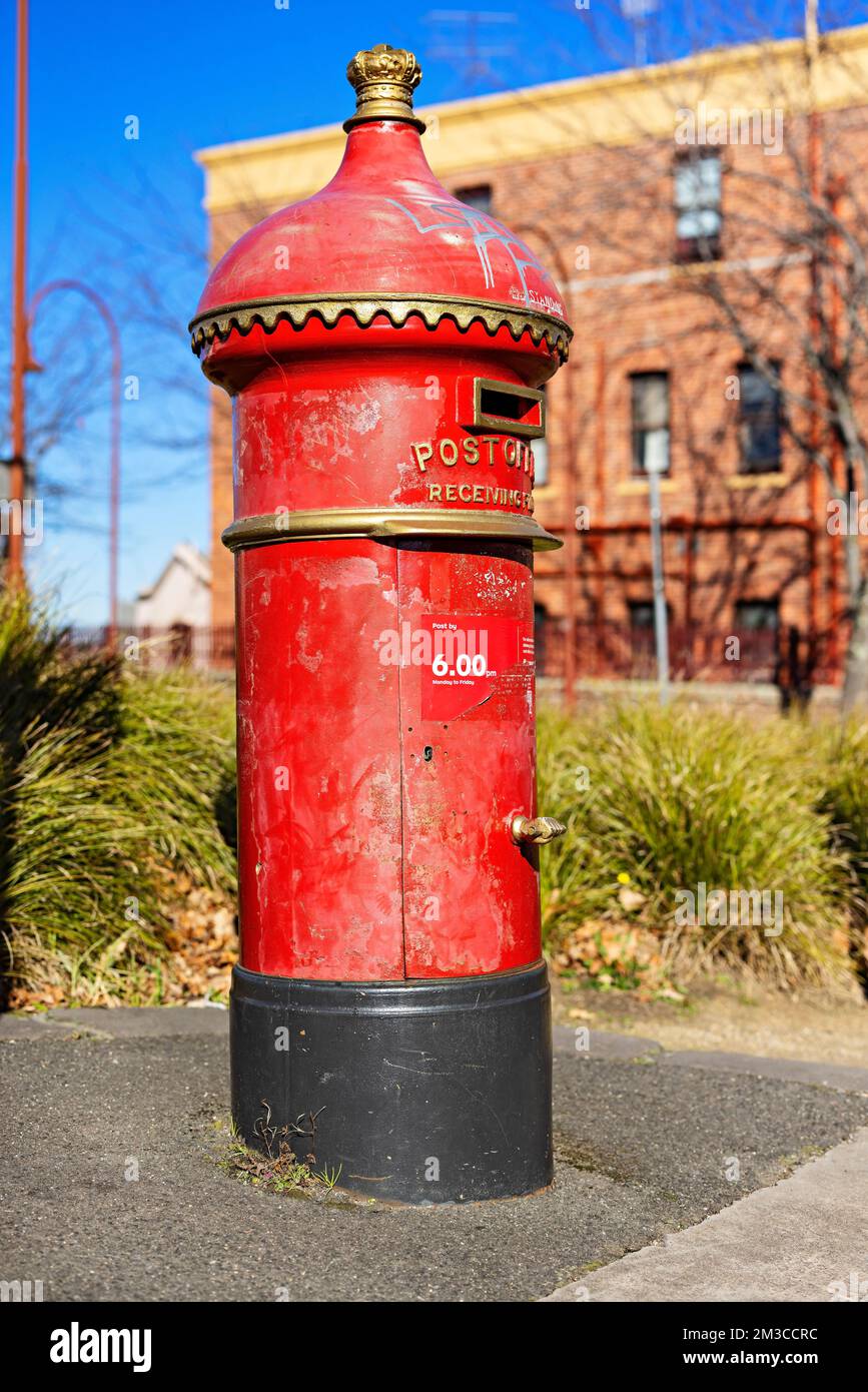 Ballarat Australia / Australia Post Red Pillar Post Box outside  the Ballarat Railway Station. Stock Photo