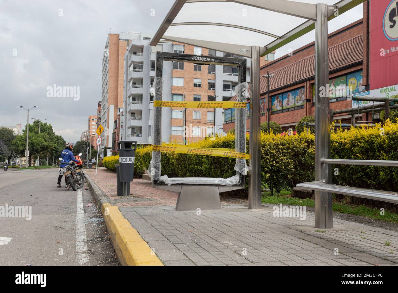 BOGOTA, COLOMBIA - MAY 20 OF 2021 A bus stop damaged during colombian paro nacional marches at north city Stock Photo