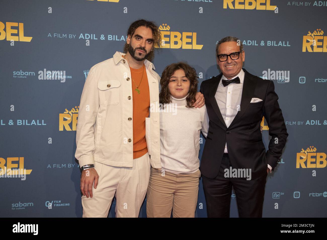 Director Adil El Arbi and Amir El Arbi and their father pictured during the premiere of 'Rebel', the latest film by Belgian director duo El Arbi - Fallah at the Kinepolis cinema in Brussels on Saturday 01 October 2022. BELGA PHOTO NICOLAS MAETERLINCK Stock Photo