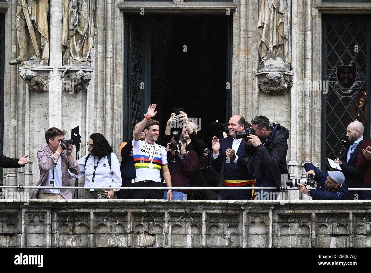 Belgian Remco Evenepoel and Brussel-bruxelles City Mayor Philippe Close pictured during the celebration on the balcony of Brussels city hall on the Grand-Place - Grote Markt, with cycling world champion, Sunday 02 October 2022, part of the celebration of world champion Evenepoel, the 22 years old, from Schepdael, Dilbeek, became world champion after a great season with a win at the Vuelta, first Belgian in 44 years to win a big tour, the Vuelta. BELGA PHOTO JASPER JACOBS  Stock Photo