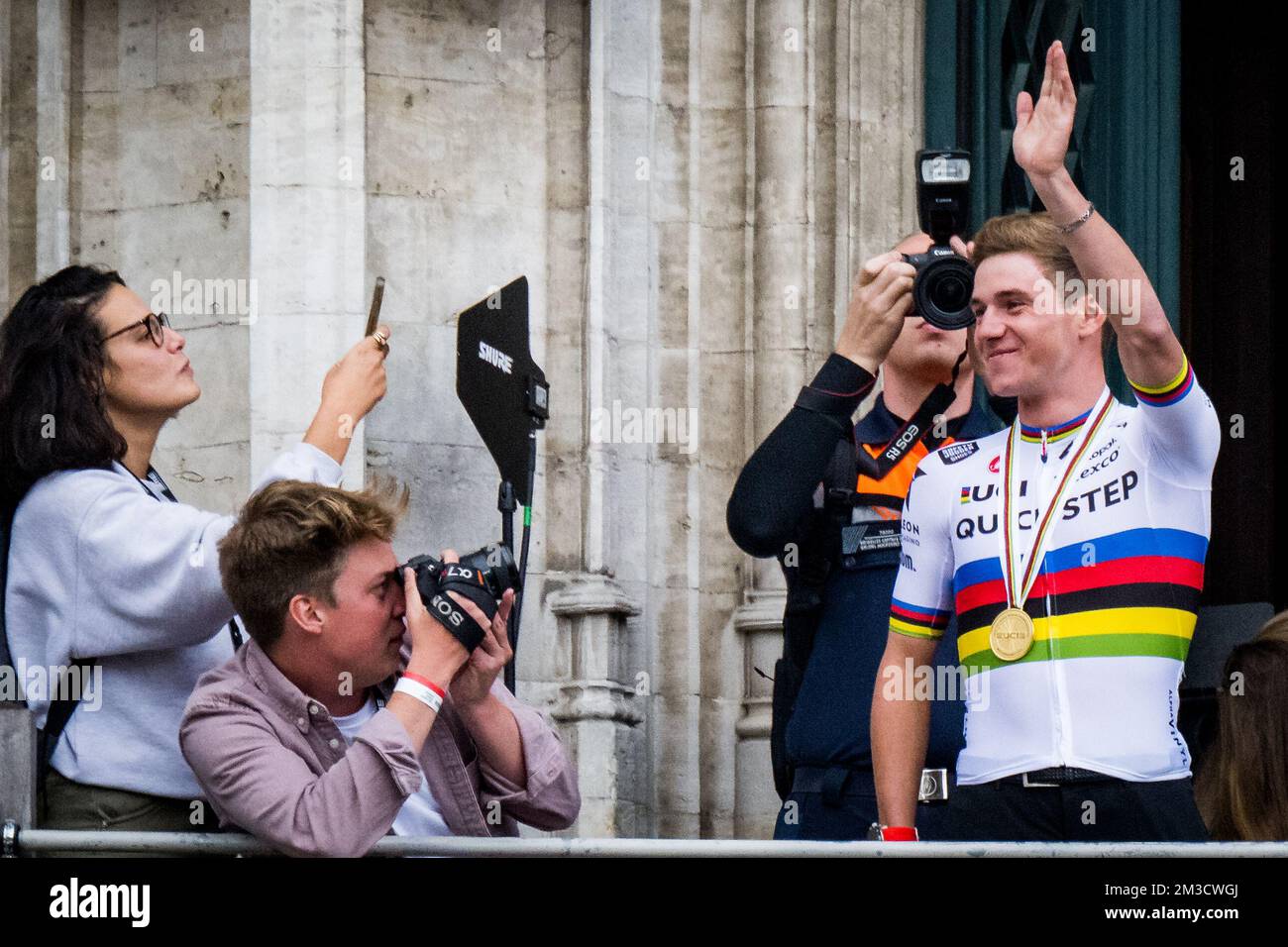 Belgian Remco Evenepoel celebrates during the arrival of a big bike ride at Brussels Grand-Place - Grote Markt, with cycling world champion, Sunday 02 October 2022, part of the celebration of world champion Evenepoel, the 22 years old, from Schepdael, Dilbeek, became world champion after a great season with a win at the Vuelta, first Belgian in 44 years to win a big tour. BELGA PHOTO JASPER JACOBS Stock Photo