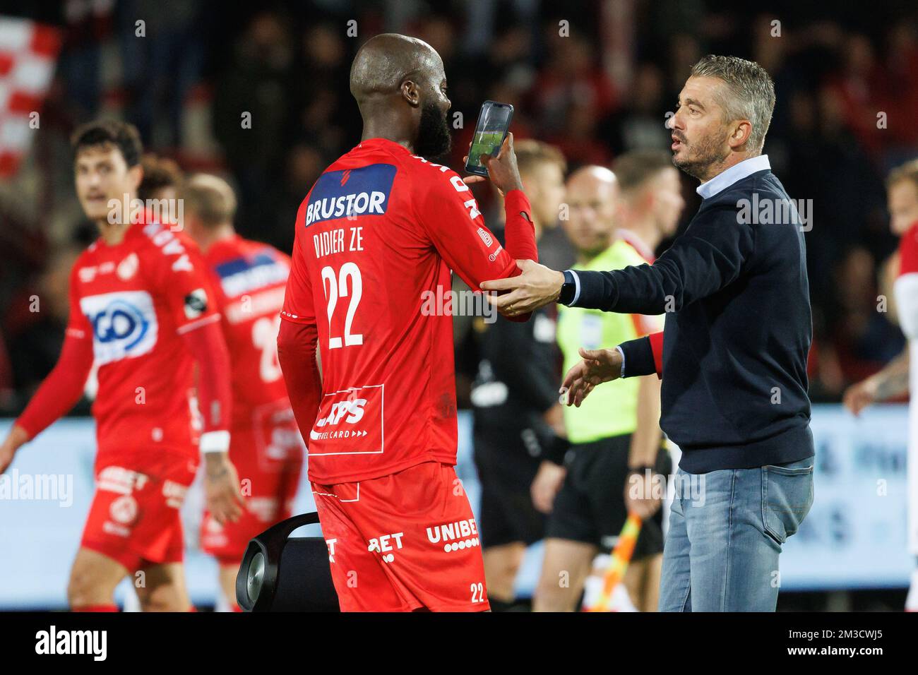 Kortrijk's Didier Lamkel Ze and Kortrijk's new head coach Adnan Custovic celebrate after winning a soccer match between KV Kortrijk and Royal Antwerp FC, Sunday 02 October 2022 in Kortrijk, on day 10 of the 2022-2023 'Jupiler Pro League' first division of the Belgian championship. BELGA PHOTO KURT DESPLENTER Stock Photo