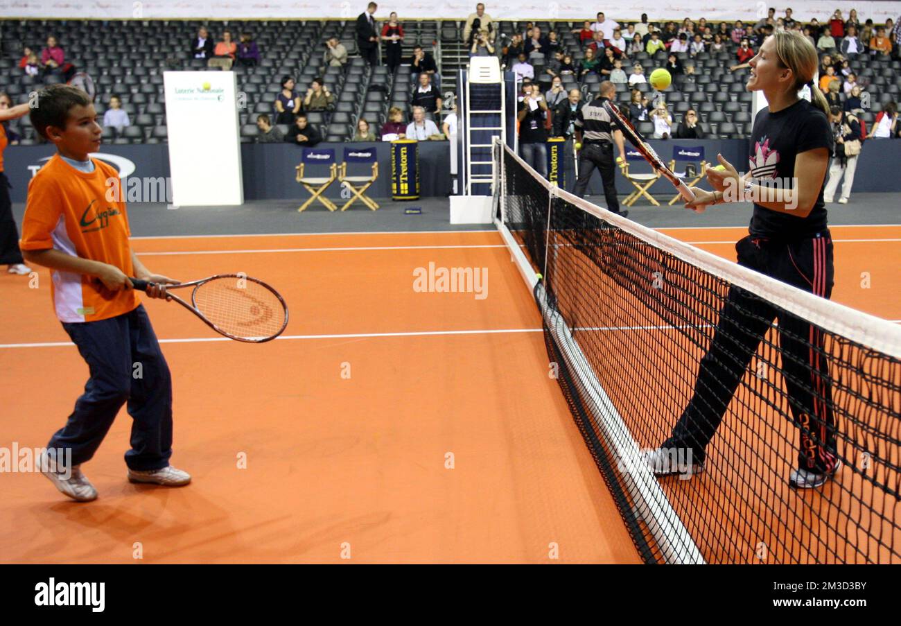 Justine Henin at a children's day event at the Mons Ethias Tennis