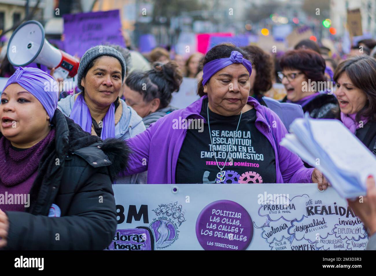 Women holding signs and marching in 8M Madrid Stock Photo - Alamy