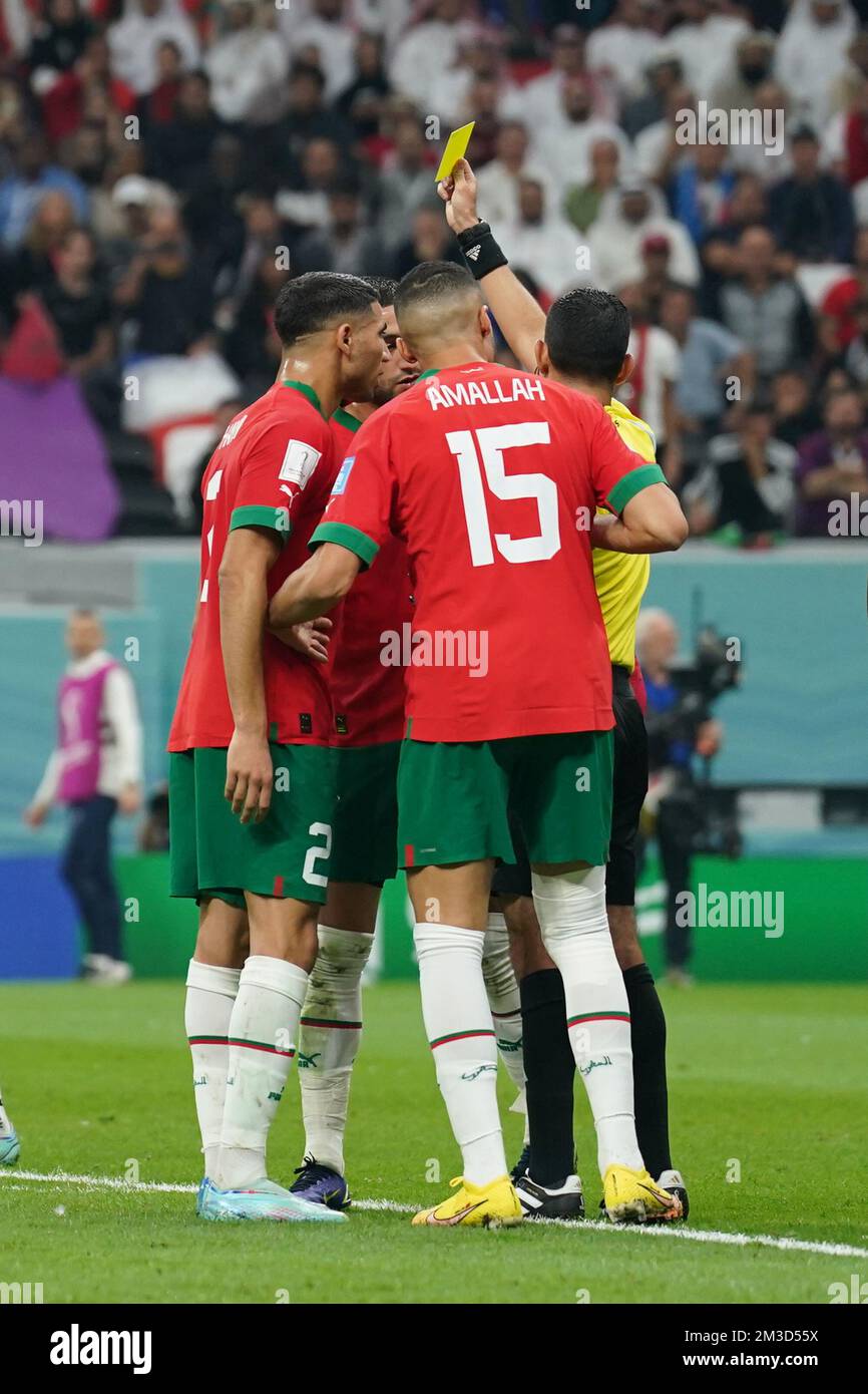 DOHA, QATAR - DECEMBER 14: Player of Morocco Sofiane Boufal receives a yellow card  during the FIFA World Cup Qatar 2022 Semi-finals match between France and Morocco at Al Bayt Stadium on December 14, 2022 in Al Khor, Qatar. (Photo by Florencia Tan Jun/PxImages) Credit: Px Images/Alamy Live News Stock Photo