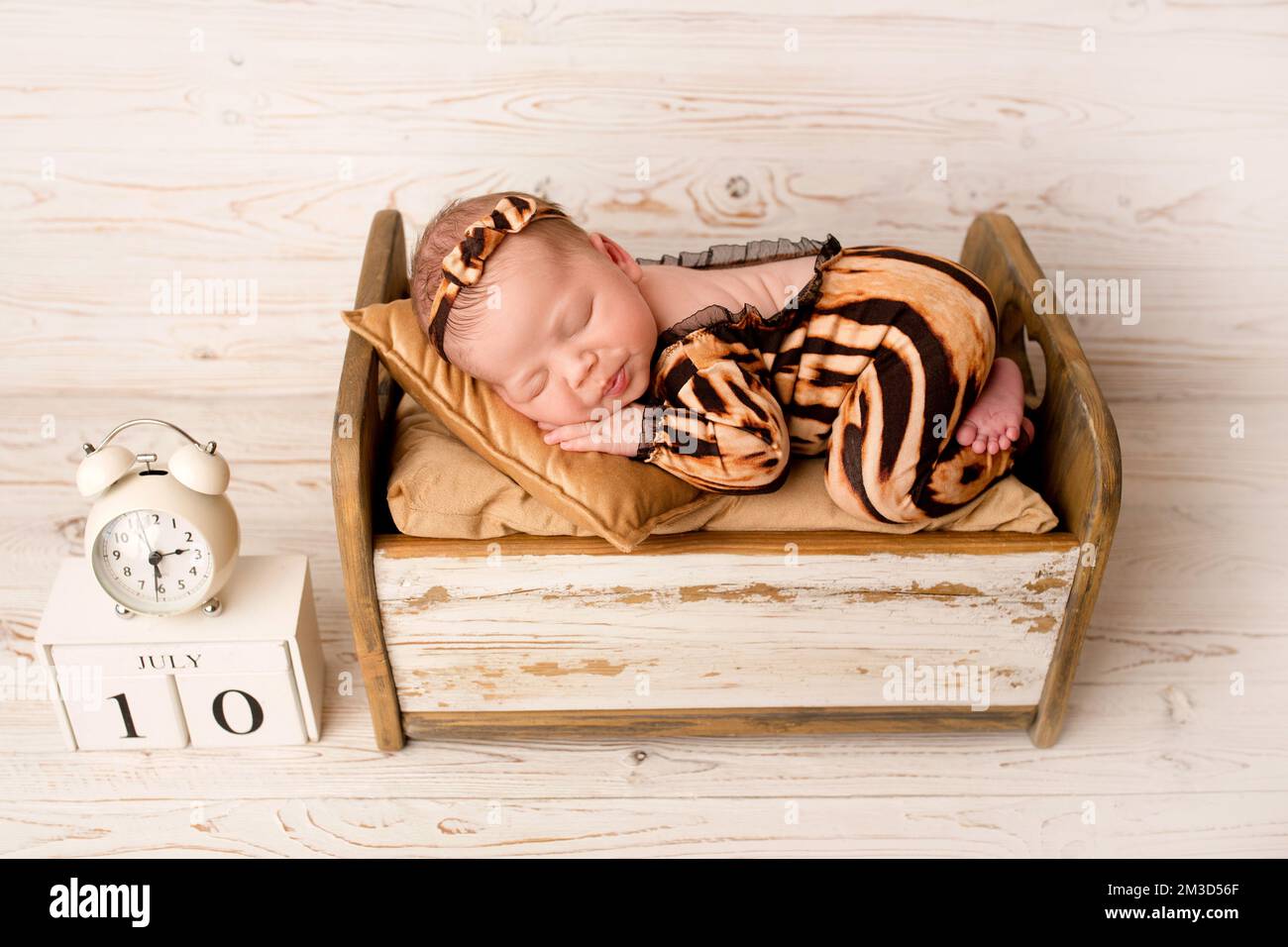 Baby girl sleeping in crib hi-res stock photography and images - Alamy