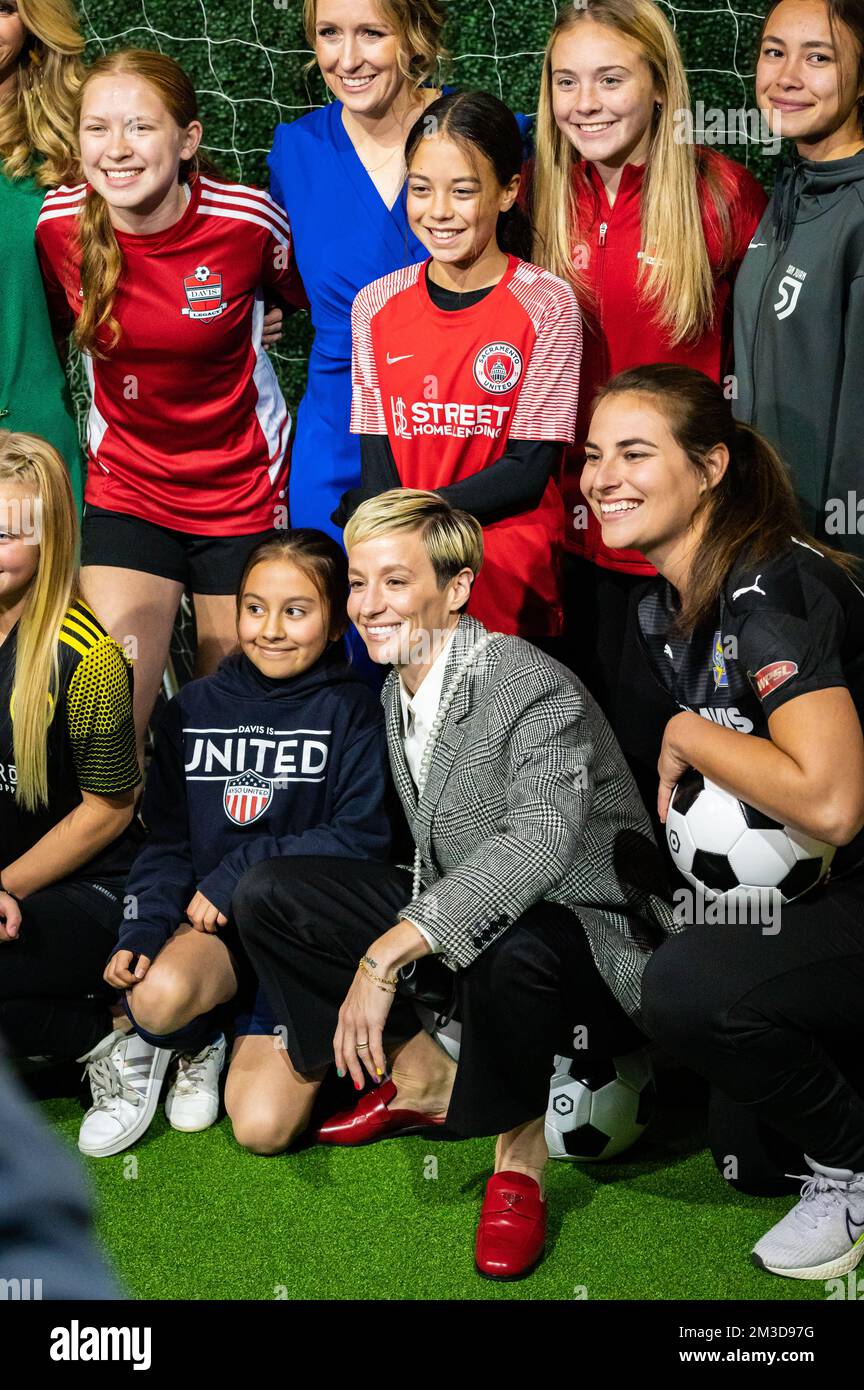 Soccer star Megan Rapinoe poses with young female soccer players at the California Museum's Hall of Fame event.  Rapinoe was honored as an inductee. Stock Photo