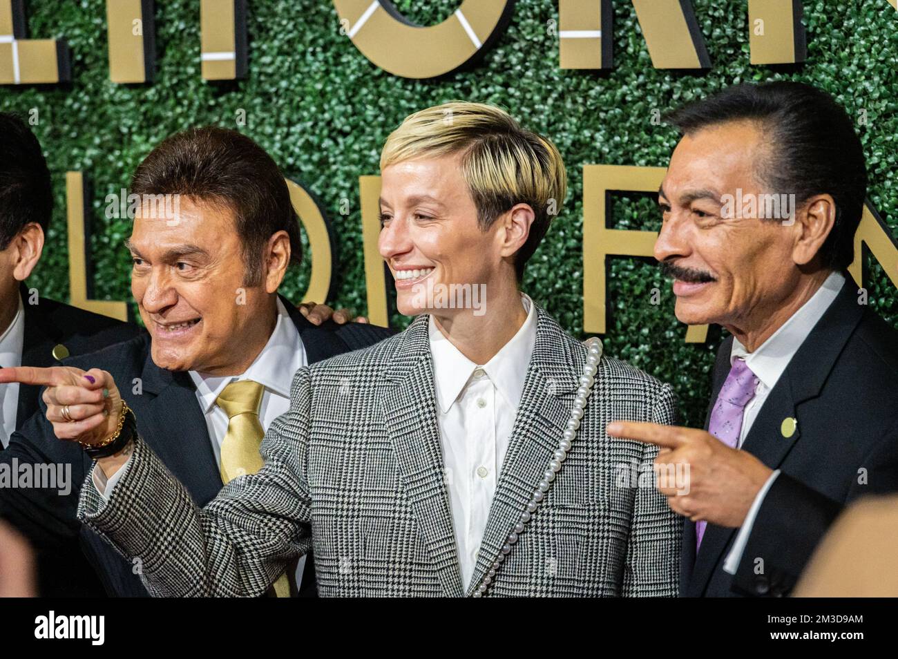 Soccer star Megan Rapinoe poses with members of the band Los Tigres del Norte. All were inducted into the state's Hall of Fame at the California Museu Stock Photo