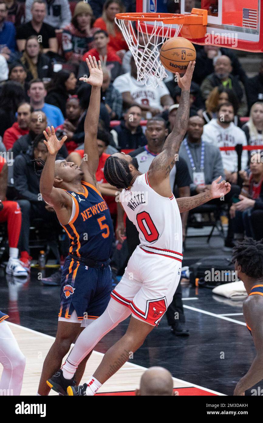 December 14, 2022, Chicago, Illinois, USA: National Basketball Association  - Chicago Bulls v New York Knicks Coby White (0 Chicago Bulls) makes a  layup during the game between the Chicago Bulls and