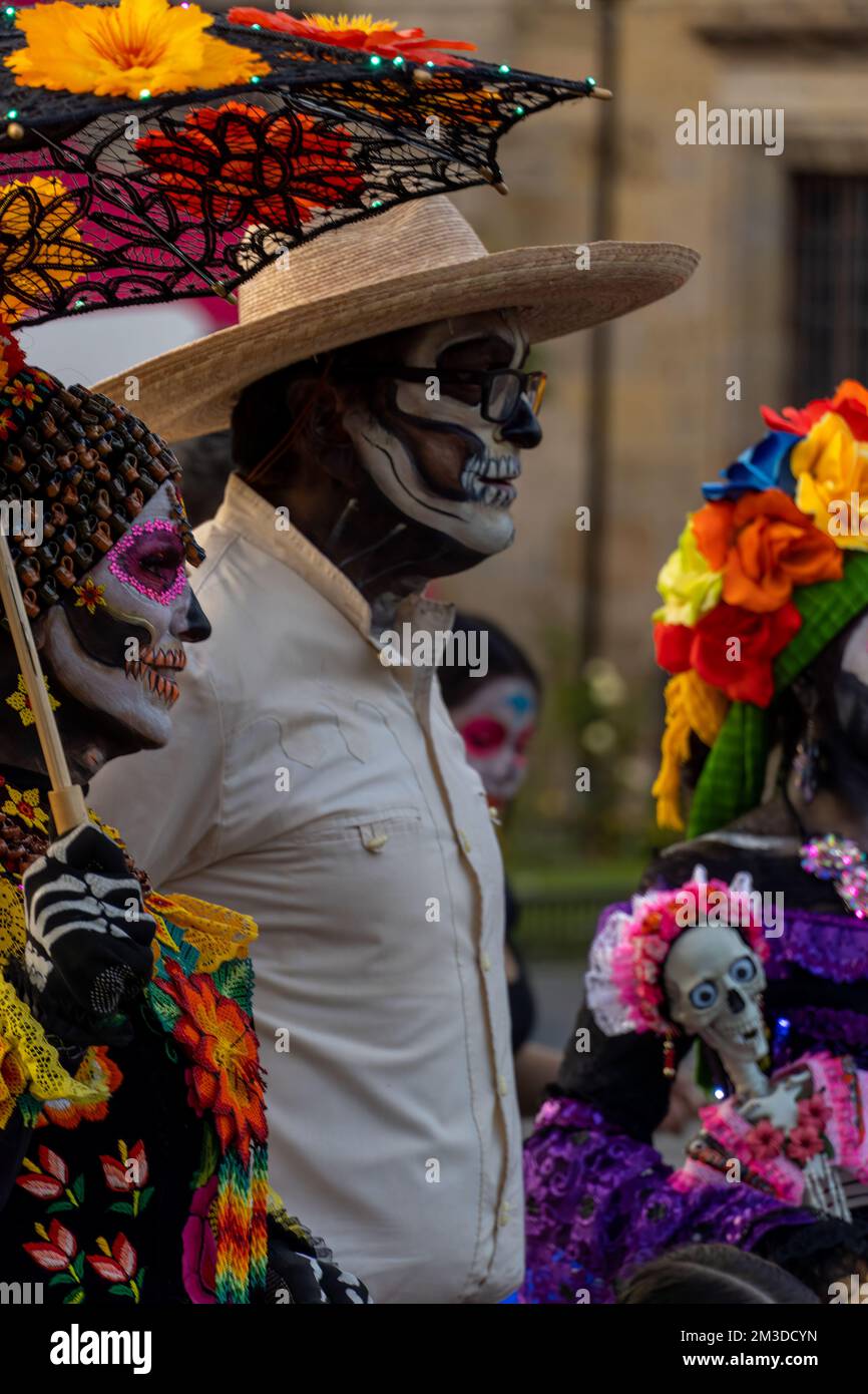 day of the dead parade with modified cars, people playing instruments, mexico latin america Stock Photo