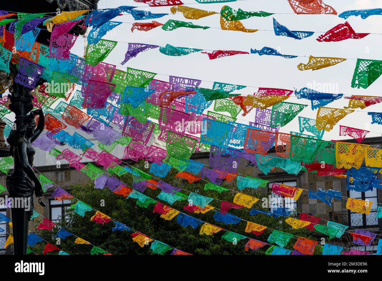 papel picado hanging in mexican festivities in public spaces, mexico Stock Photo