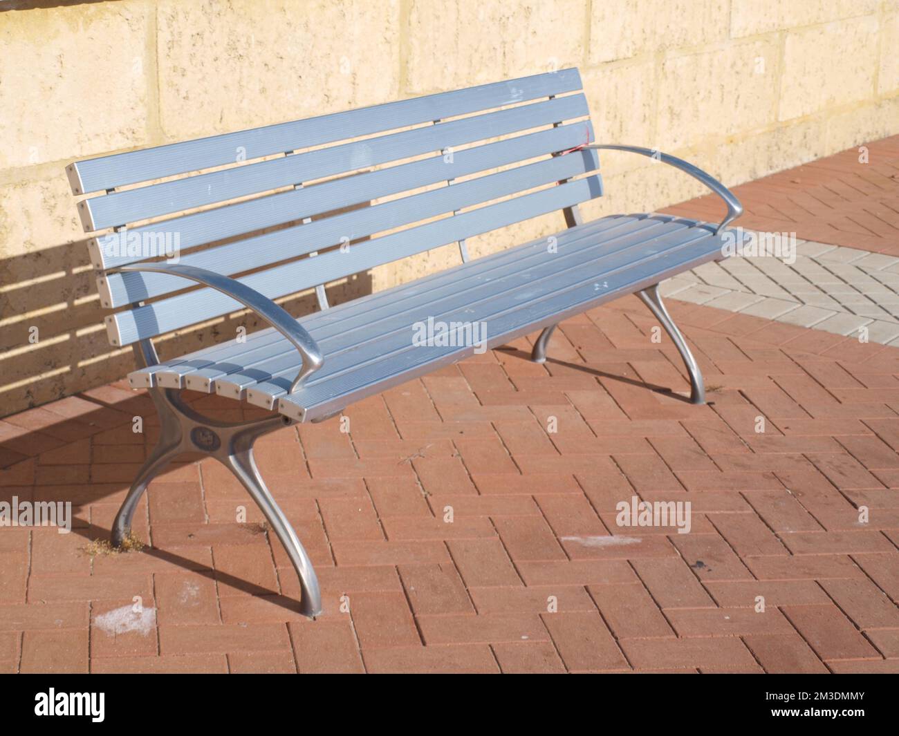 Close up photo of Silver chair on the paving street in Mandurah, Ausralia. Stock Photo