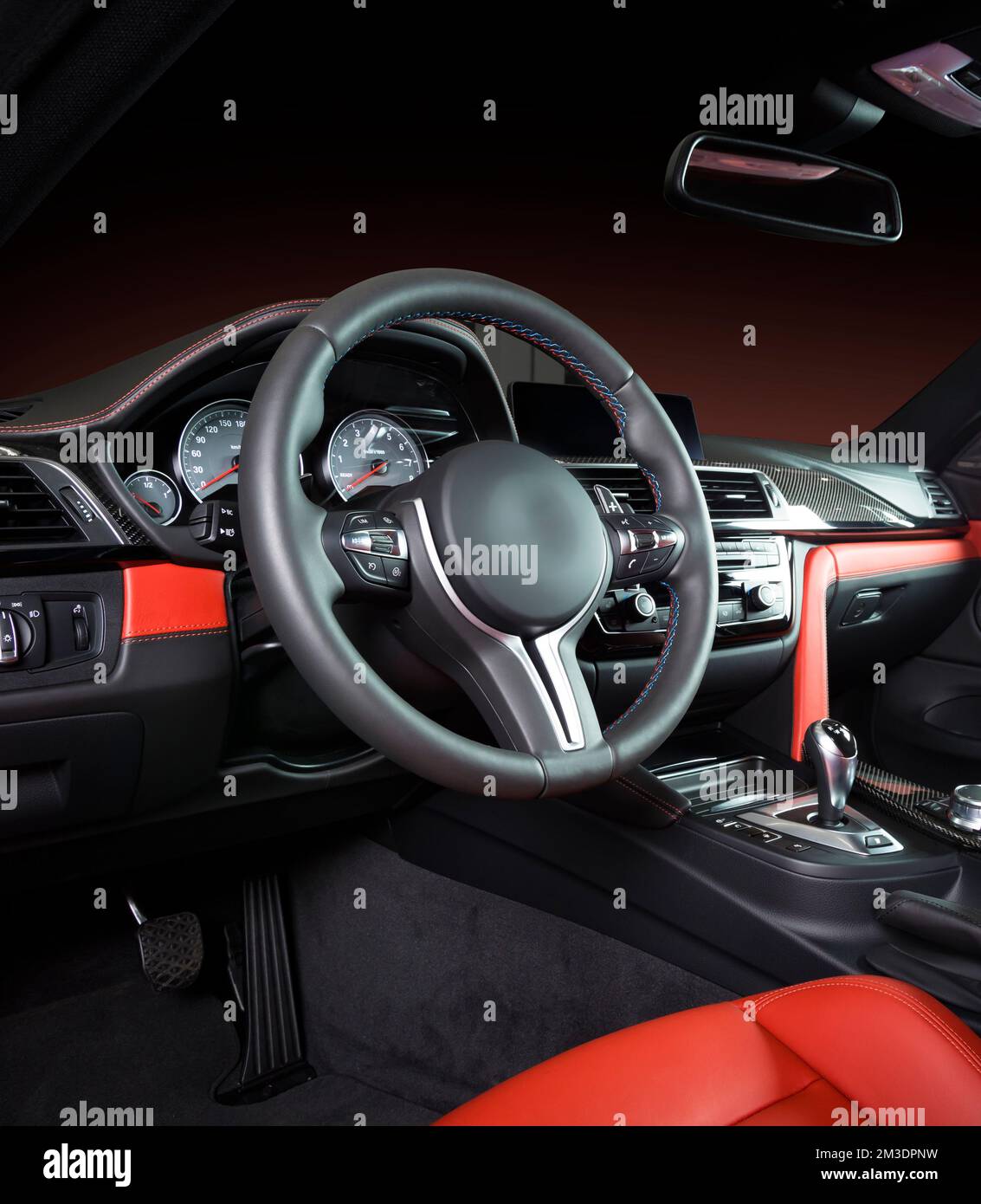 Modern luxury car Interior steering wheel, shift lever and dashboard