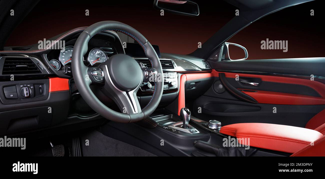 Modern luxury car Interior - steering wheel, shift lever and dashboard ...