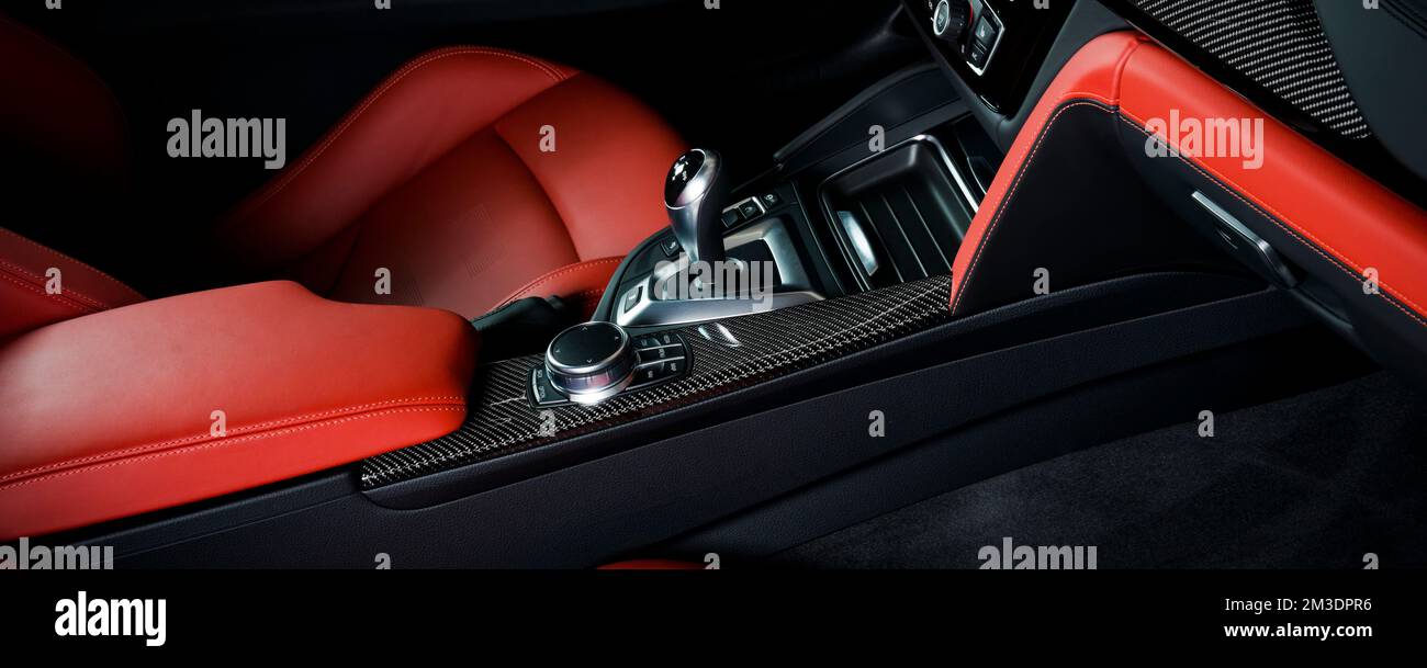 Modern luxury car Interior steering wheel, shift lever and dashboard