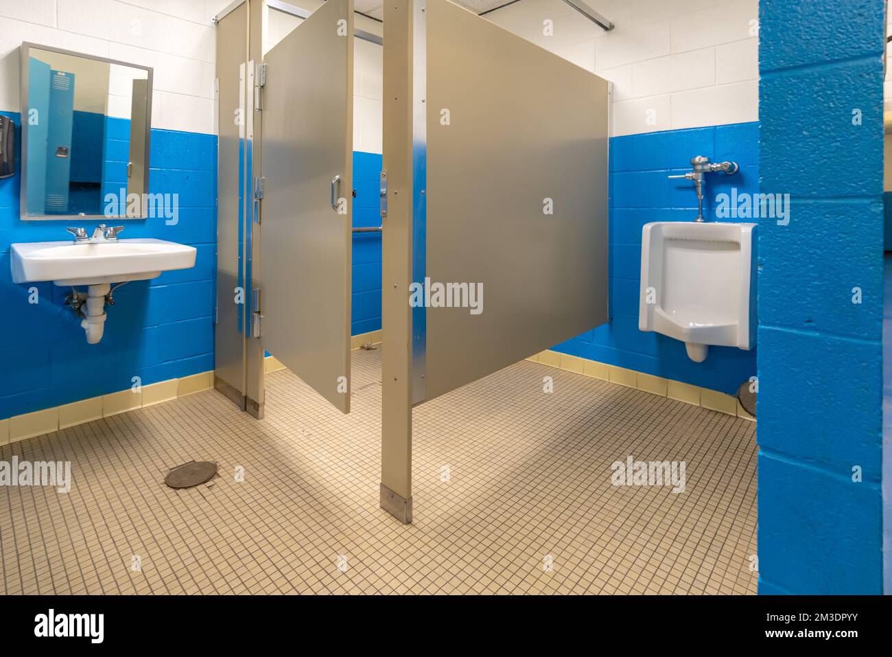 white urinal in men's bathroom Stock Photo Alamy